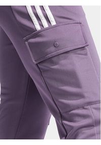 Adidas - adidas Spodnie dresowe Tiro Cargo IJ8420 Fioletowy Regular Fit. Kolor: fioletowy. Materiał: syntetyk