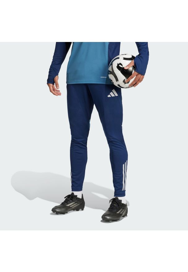 Adidas - Spodnie Arsenal Tiro 25 Competition Training. Kolor: niebieski. Materiał: dresówka. Sport: fitness, piłka nożna