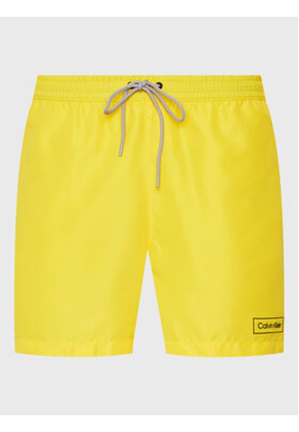Calvin Klein Swimwear Szorty kąpielowe KM0KM00787 Żółty Regular Fit. Kolor: żółty. Materiał: syntetyk