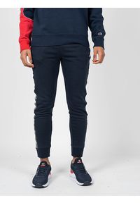 Champion Spodnie "Sweat Pants" | 216561 | Mężczyzna | Granatowy. Okazja: na co dzień. Kolor: niebieski. Materiał: bawełna, poliester. Wzór: nadruk. Styl: casual #2