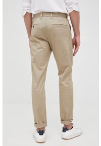 G-Star RAW - G-Star Raw spodnie męskie kolor beżowy w fasonie chinos. Kolor: beżowy. Materiał: tkanina. Wzór: gładki #2