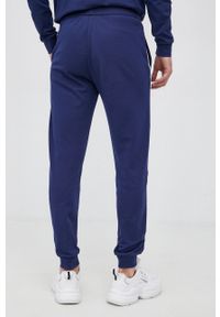 BOSS - Boss Spodnie męskie kolor granatowy gładkie. Kolor: niebieski. Materiał: dzianina. Wzór: gładki