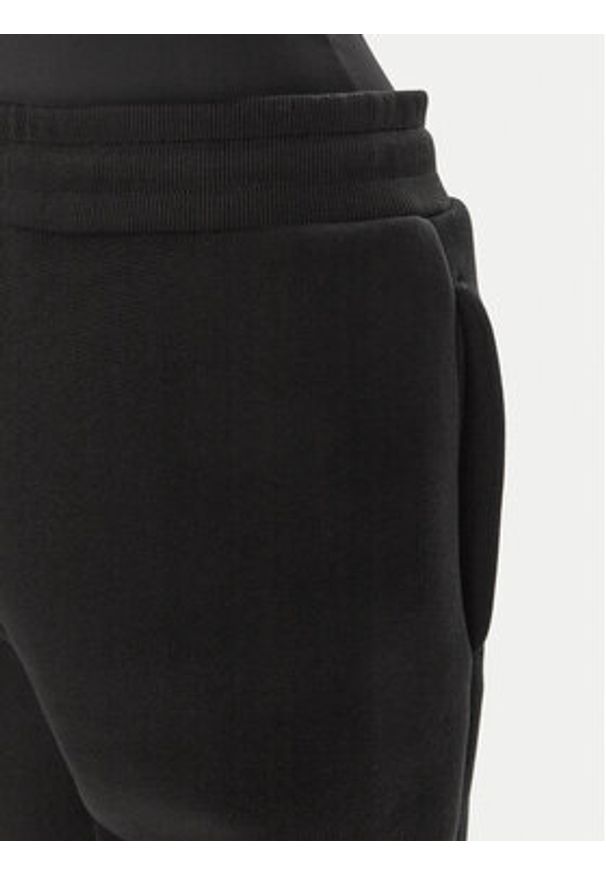 AMI PARIS Spodnie dresowe UTR237.749 Czarny Relaxed Fit. Kolor: czarny. Materiał: bawełna