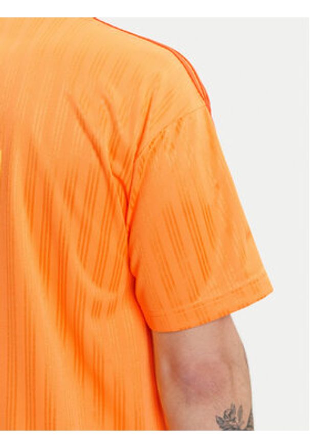 Adidas - adidas T-Shirt adicolor JP1027 Żółty Loose Fit. Kolor: żółty. Materiał: syntetyk