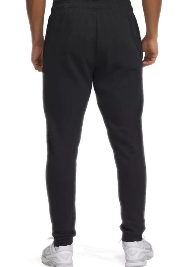 Spodnie dresowe męskie Under Armour. Kolor: czarny. Materiał: dresówka. Długość: długie