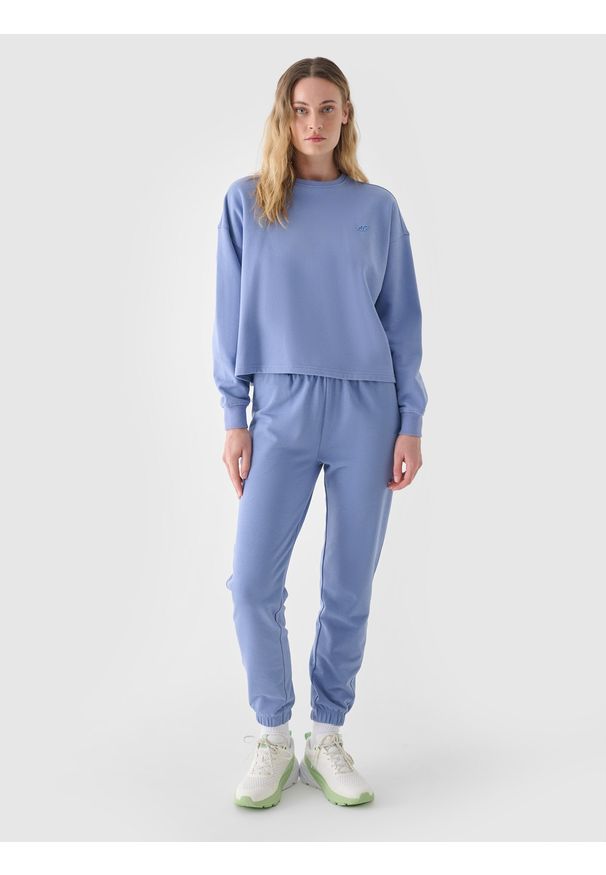 4f - 4F Spodnie dresowe joggery damskie - niebieskie XL. Kolor: niebieski. Materiał: dresówka. Wzór: gładki, ze splotem