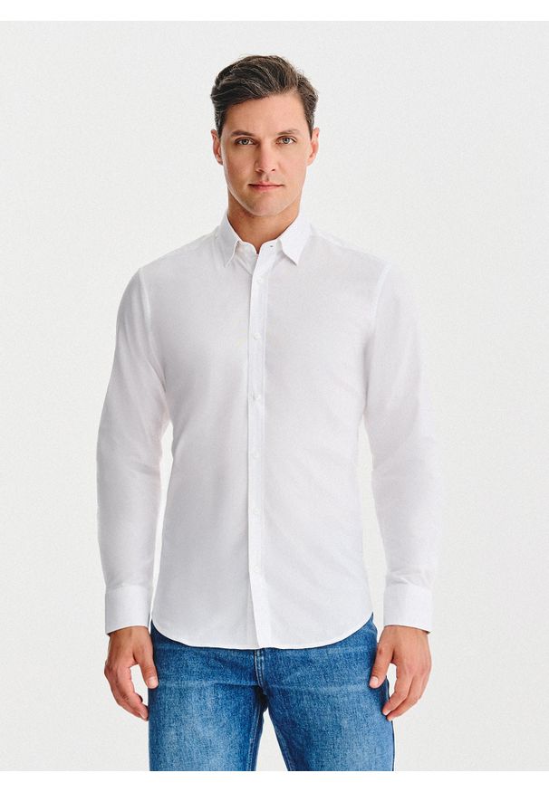 Pako Lorente - PAKO LORENTE – Biała bawełniana koszula męska. Kolor: niebieski, biały, czarny. Materiał: bawełna. Długość rękawa: długi rękaw. Długość: długie. Wzór: gładki