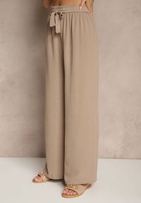 Renee - Ciemnobeżowe Szerokie Spodnie High Waist z Wiązaniem w Talii Reivaritta. Okazja: na co dzień, na spotkanie biznesowe, do pracy. Stan: podwyższony. Kolor: beżowy. Styl: biznesowy, elegancki, casual #5
