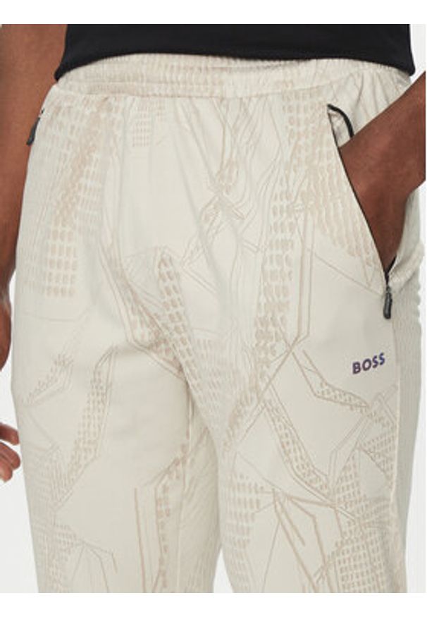 BOSS Spodnie dresowe Hicon Desert Active 50537761 Beżowy Slim Fit. Kolor: beżowy. Materiał: syntetyk