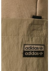 adidas Originals - Spodnie. Kolor: zielony. Materiał: bawełna, nylon, materiał, dzianina. Wzór: gładki #2