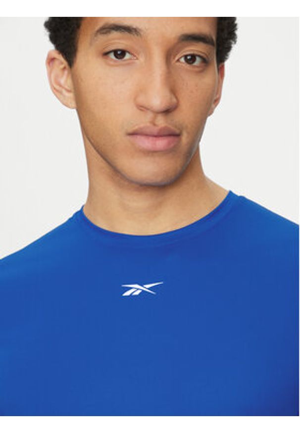 Reebok T-Shirt 100214886 Niebieski Regular Fit. Kolor: niebieski. Materiał: syntetyk