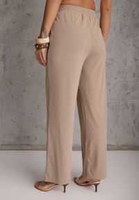 Renee - Beżowe Prążkowane Spodnie High Waist z Szerokimi Nogawkami Ginorria. Stan: podwyższony. Kolor: beżowy. Materiał: prążkowany. Długość: krótkie. Sezon: lato #4