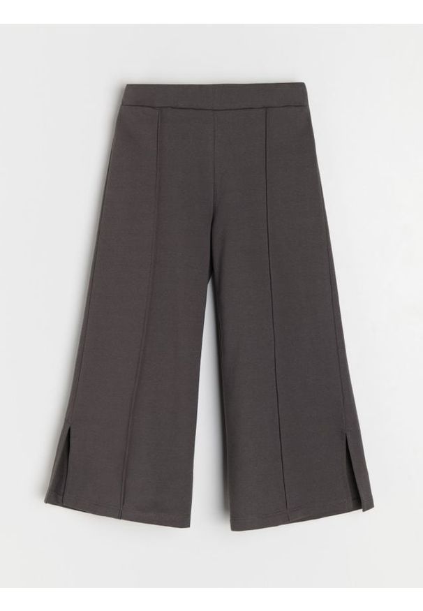 Sinsay - Spodnie dresowe wide leg z ozdobnymi rozcięciami - szary. Kolor: szary. Materiał: dresówka