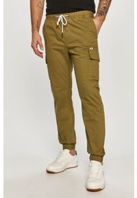 Tommy Jeans - Spodnie. Okazja: na co dzień. Kolor: zielony. Materiał: tkanina. Wzór: gładki. Styl: casual #1