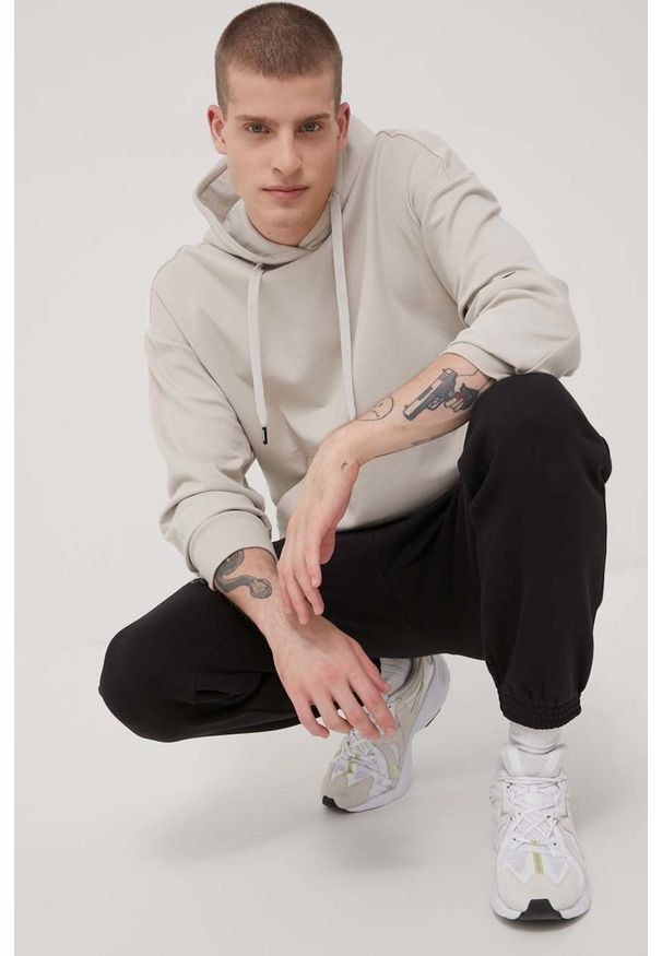 Reebok Classic spodnie męskie kolor czarny gładkie. Kolor: czarny. Materiał: bawełna. Wzór: gładki