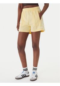 Adidas - adidas Szorty sportowe Firebird Classic KD3669 Żółty Regular Fit. Kolor: żółty. Materiał: syntetyk #1