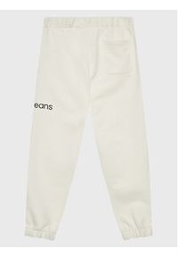 Calvin Klein Jeans Spodnie dresowe Disrupted Inst. Logo IU0IU00323 Beżowy Regular Fit. Kolor: beżowy. Materiał: bawełna #3