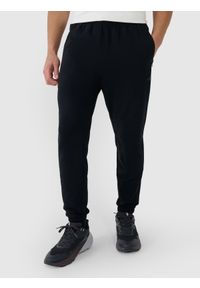 4f - 4F Spodnie dresowe joggery męskie - czarne L. Kolor: czarny. Materiał: dresówka. Wzór: gładki, ze splotem
