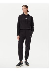 Calvin Klein Jeans Spodnie dresowe Monologo J20J225354 Czarny Slim Fit. Kolor: czarny. Materiał: bawełna #5