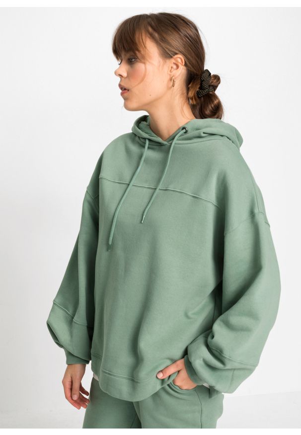 bonprix - Bluza z kapturem oversized. Typ kołnierza: kaptur. Kolor: zielony