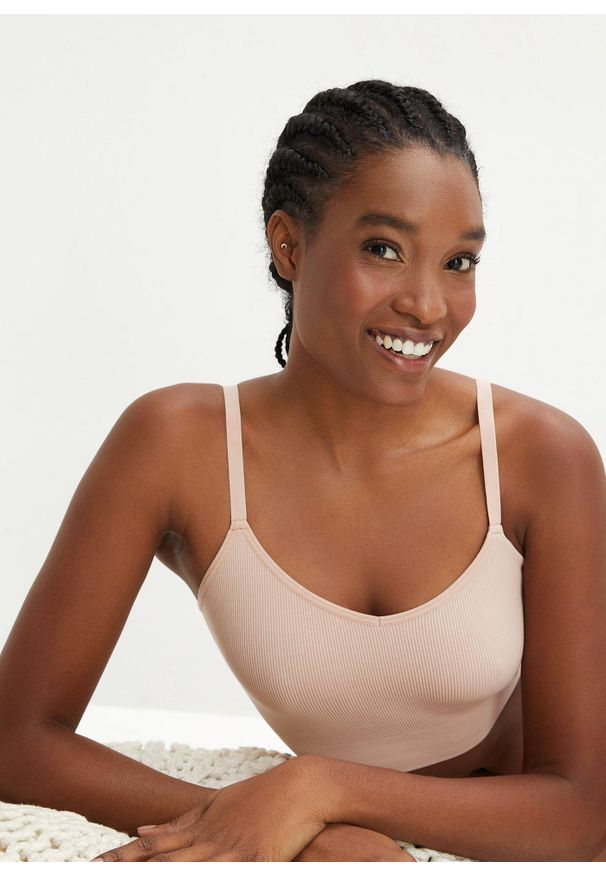 bonprix - Biustonosz bustier bezszwowy Feel Comfort w prążek. Kolor: beżowy. Materiał: materiał. Wzór: prążki