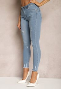 Renee - Jasnoniebieskie Jeansy Modelujące Push Up Ozdobione Przedarciami Qandara. Kolor: niebieski. Wzór: aplikacja #5