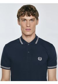 Big-Star - Koszulka męska polo granatowa Poller 403. Okazja: na co dzień. Typ kołnierza: polo. Kolor: niebieski. Materiał: jeans, materiał, dzianina. Wzór: ze splotem, haft, aplikacja. Styl: sportowy, casual #3