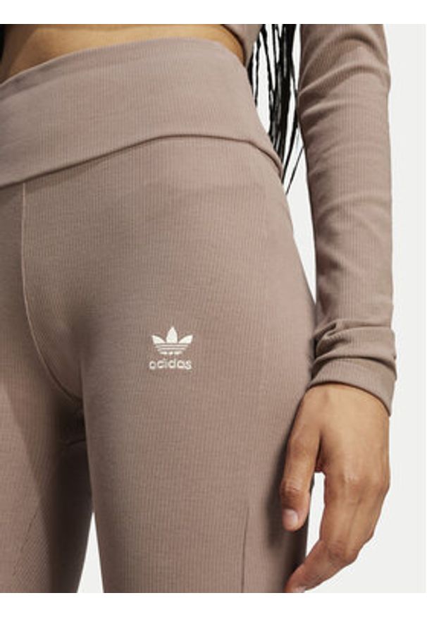 Adidas - adidas Legginsy Essentials JC9023 Beżowy Flare Fit. Kolor: beżowy. Materiał: bawełna