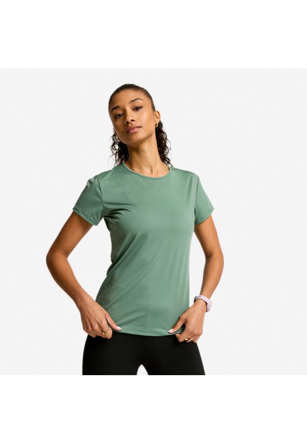 DOMYOS - Koszulka fitness damska Domyos krótki rękaw. Kolor: zielony. Materiał: poliester, elastan, materiał. Długość rękawa: krótki rękaw. Długość: krótkie. Sport: fitness