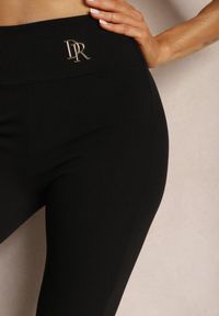 Renee - Czarne Casualowe Legginsy High Waist z Prążkowanej Tkaniny z Ozdobną Klamrą Dimonique. Okazja: na co dzień. Stan: podwyższony. Kolor: czarny. Materiał: tkanina, prążkowany. Styl: casual #4