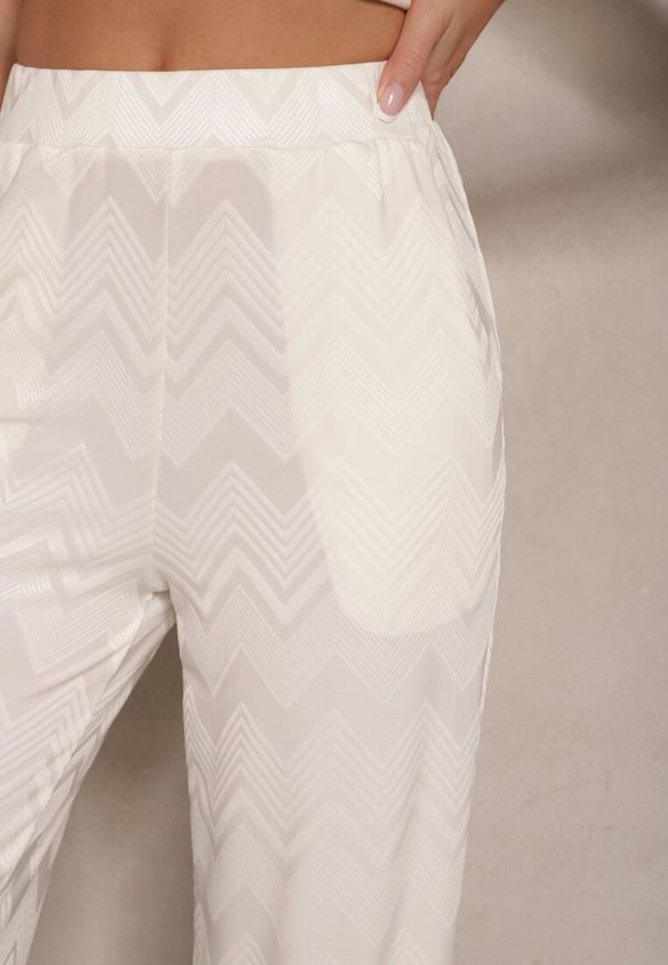 Renee - Jasnobeżowe Spodnie z Wiskozą o Szerokim Kroju High Waist Weralis. Okazja: na co dzień. Stan: podwyższony. Kolor: beżowy. Materiał: wiskoza. Styl: elegancki, casual