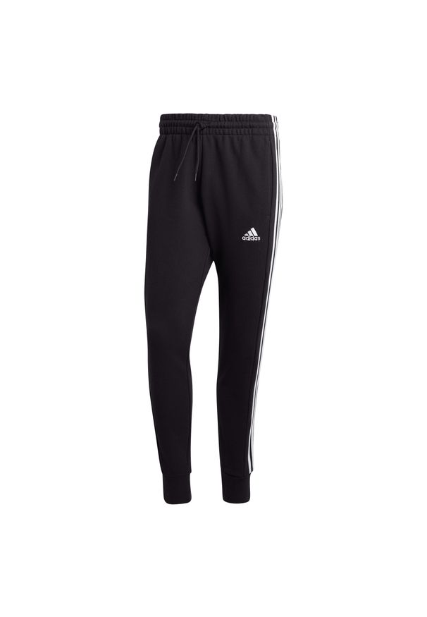 Adidas - Spodnie męskie adidas Essentials French Terry Tapered Cuff 3-Stripes. Kolor: biały, czarny, szary, wielokolorowy. Materiał: bawełna, materiał. Sport: joga i pilates, fitness