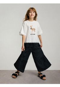 Reserved - Spodnie w kropki - czarny. Kolor: czarny. Materiał: tkanina. Wzór: kropki #1