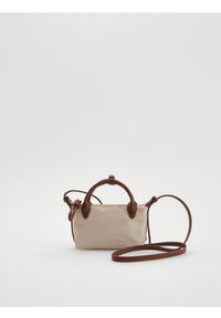 Reserved - Torebka crossbody - beżowy. Kolor: beżowy. Wzór: gładki