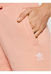 Adidas - adidas Spodnie dresowe adicolor Essentials H37874 Różowy Slim Fit. Kolor: różowy. Materiał: bawełna, dresówka #5
