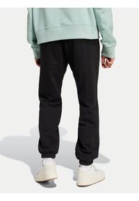 Adidas - adidas Spodnie dresowe Premium Essentials IY2245 Czarny Loose Fit. Kolor: czarny. Materiał: bawełna #2