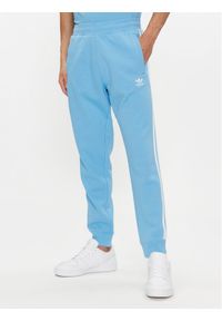 Adidas - adidas Spodnie dresowe adicolor 3-Stripes IM9451 Niebieski Slim Fit. Kolor: niebieski. Materiał: bawełna #1