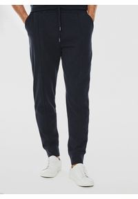 Pako Lorente - Dzianinowe spodnie dresowe w granatowym kolorze. Okazja: na co dzień. Kolor: niebieski. Materiał: dresówka, dzianina. Wzór: gładki. Styl: casual #1