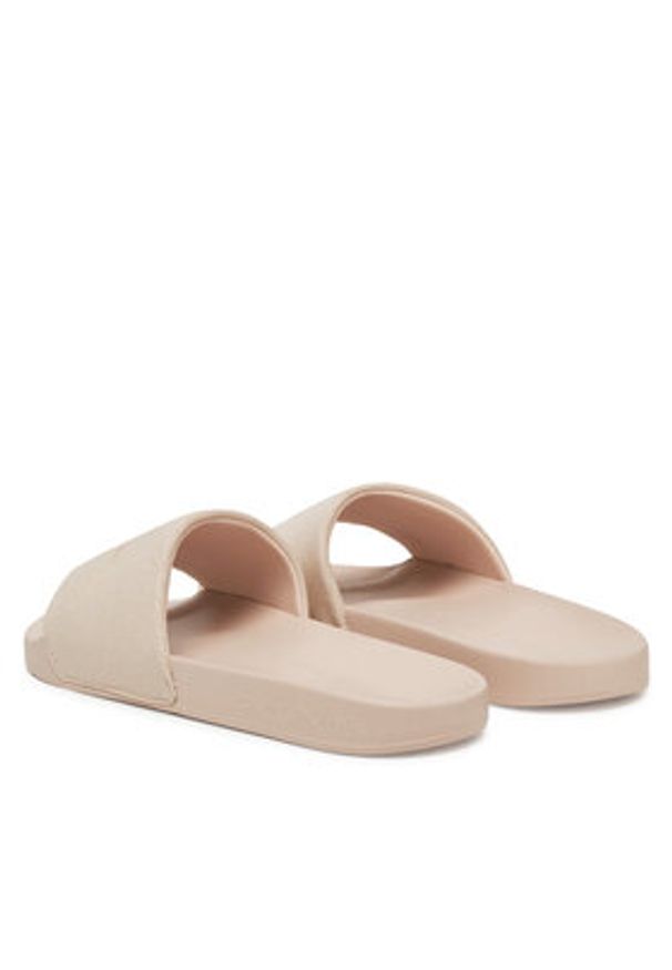 Calvin Klein Jeans Klapki Slide Monogram Wn YW0YW01835 Beżowy. Kolor: beżowy. Materiał: materiał