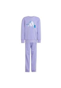 Adidas - Zestaw adidas Disney Lilo & Stitch Jogger Kids. Kolor: fioletowy, różowy, wielokolorowy. Materiał: bawełna, dresówka. Wzór: motyw z bajki #2