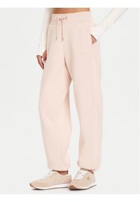 Guess Spodnie dresowe V5BB10 KB681 Różowy Regular Fit. Kolor: różowy. Materiał: syntetyk, bawełna #1