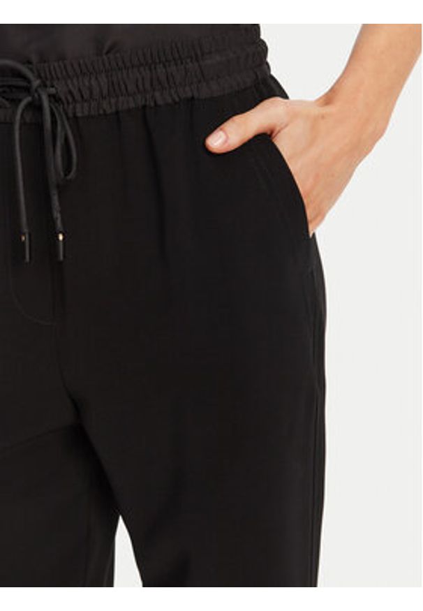 Marella Spodnie dresowe Abitata 2513131045 Czarny Regular Fit. Kolor: czarny. Materiał: syntetyk