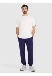 4f - 4F Spodnie dresowe joggery męskie - granatowe S. Kolor: niebieski. Materiał: dresówka. Wzór: ze splotem, gładki #1