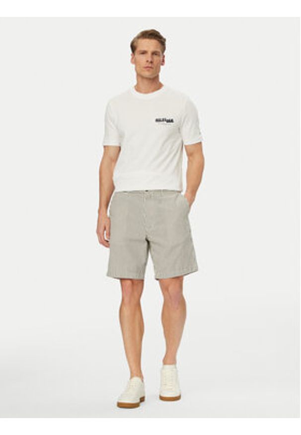 TOMMY HILFIGER - Tommy Hilfiger Szorty materiałowe Dover Seersucker MW0MW42359 Beżowy jasny Slim Fit. Kolor: beżowy. Materiał: bawełna
