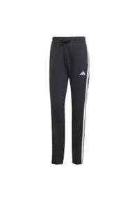 Adidas - Spodnie Essentials 3-Stripes French Terry Cuffed. Kolor: biały, wielokolorowy, czarny. Materiał: materiał