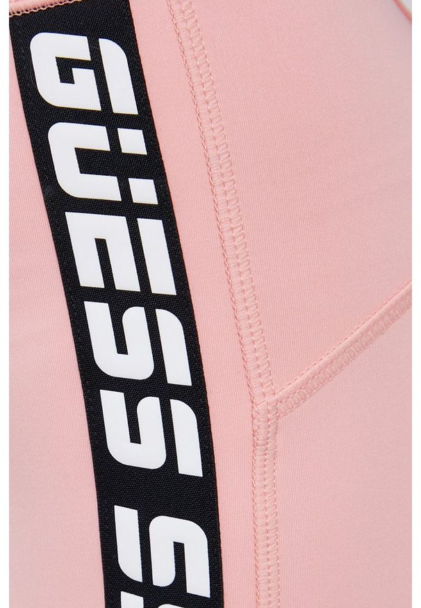 Guess - Legginsy. Kolor: różowy. Materiał: skóra, dzianina. Wzór: nadruk