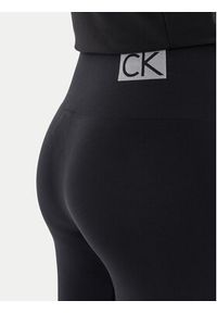 Calvin Klein Legginsy 701233681 Czarny Slim Fit. Kolor: czarny. Materiał: syntetyk