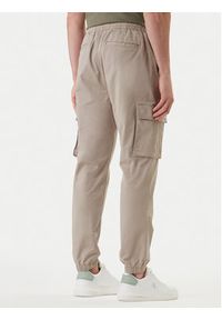 Calvin Klein Jeans Joggery Comfort LV04RD608G Beżowy Skinny Fit. Kolor: beżowy. Materiał: bawełna #5