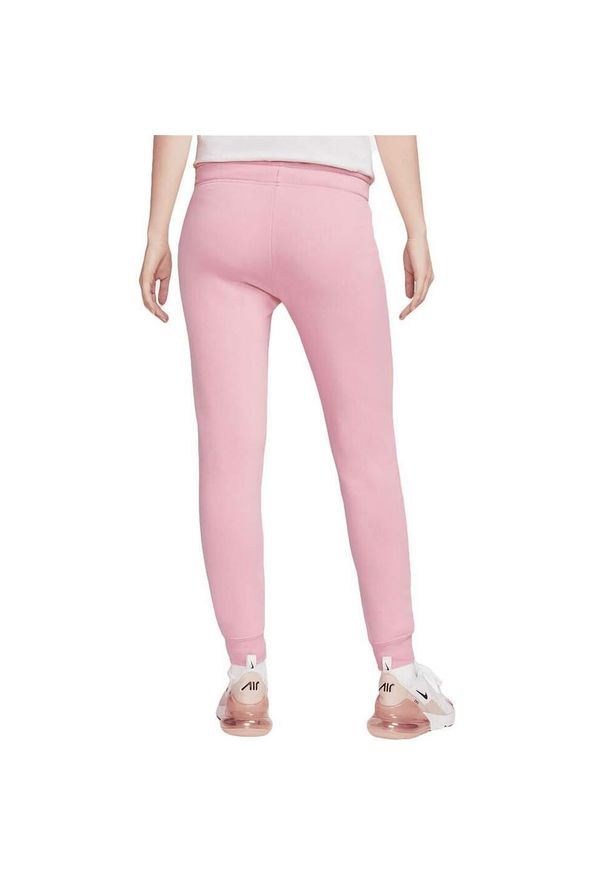 Nike - Spodnie Mid-Rise Slim Rozmiar M Różowy - DQ5174-690. Kolor: różowy. Materiał: materiał. Sport: fitness
