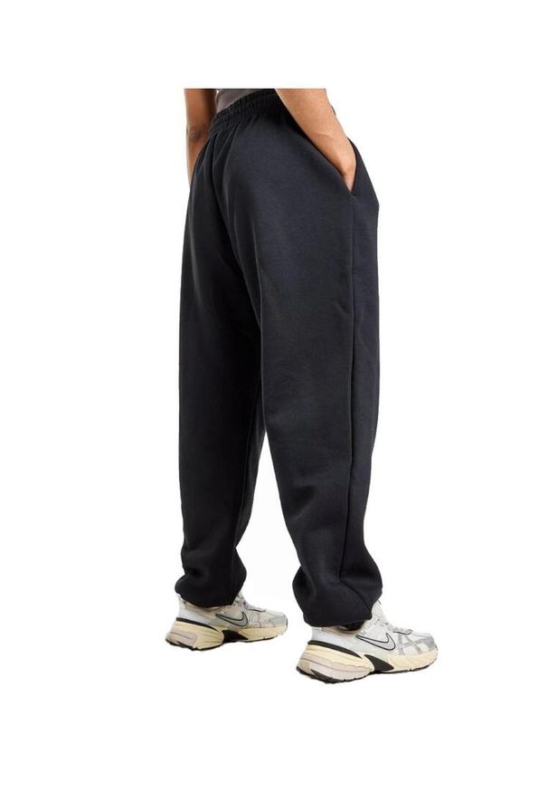 Spodnie damskie Nike Sportswear Phoenix Fleece Mid-Rise. Kolor: czarny